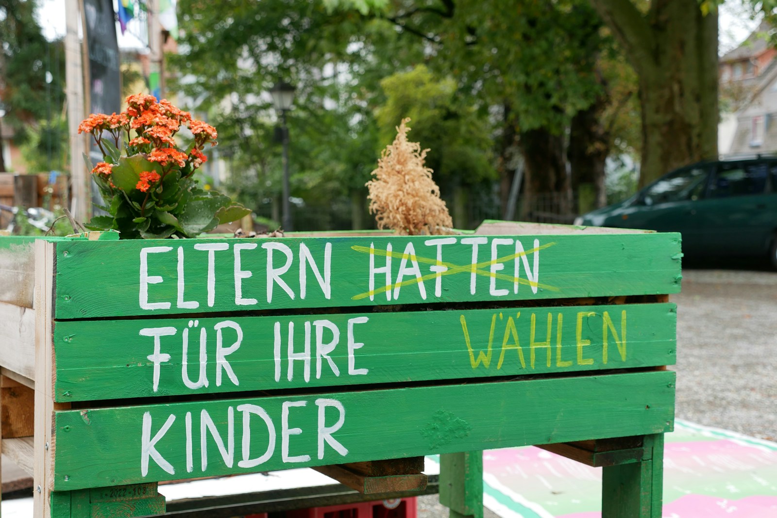 a wooden sign with words written on it